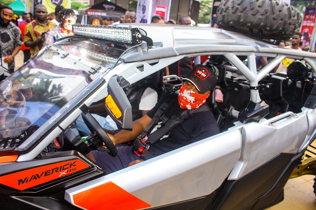 man inside a sports car